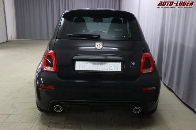 595 & 695 MY23 595 1.4 T-Jet 121 kW (165 PS) MT 876 - Scorpione Schwarz 557 - Integral-Sportsitze Leder Schwarz "3L3 Komfort-Paket: Bi-Xenon Scheinwerfer, Beats® Audio Soundsystem 3L4 Tech-Paket 5CE Scorpione Schwarz 9SV, Gutschrift Mopar BMC Sportluftfilter und Tankdeckel aus Aluminium A67 Linea Turismo"