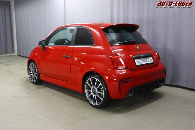 595 & 695 MY23 595 1.4 T-Jet 121 kW (165 PS) MT 111 - Passione Rot 557 - Integral-Sportsitze Leder Schwarz "3L3 Komfort-Paket: Bi-Xenon Scheinwerfer, Beats® Audio Soundsystem 3L4 Tech-Paket 5CJ Passione Rot 9SV, Gutschrift Mopar BMC Sportluftfilter und Tankdeckel aus Aluminium A67 Linea Turismo"