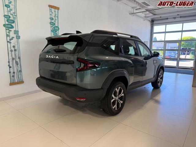 Dacia Bigster Zeder Gruen