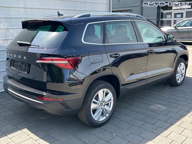 Skoda Karoq Extra Plus 2.0 TDI DSG AHK*Android Auto*Matrix*E-Heck*SHZ*ACC*Keyless*Kamera*17" LM* 2Z Klimaauto*SUNSET 