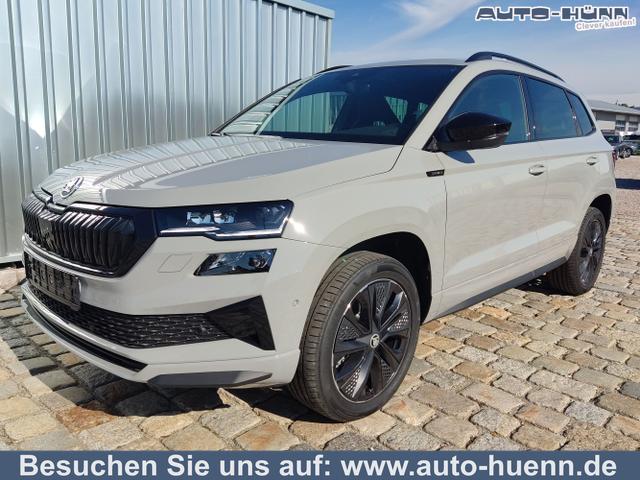 Skoda Karoq - Sportline 1,5 TSI 150 PS DSG Navi-4x Sitzheizung-Canton Sound-Anhängerkupplung-LED-Matrix-AppleCarPlay-Android-Auto-ACC-Kessy-2-Zonen-Klimaautomatik-18''Alu-Sofort