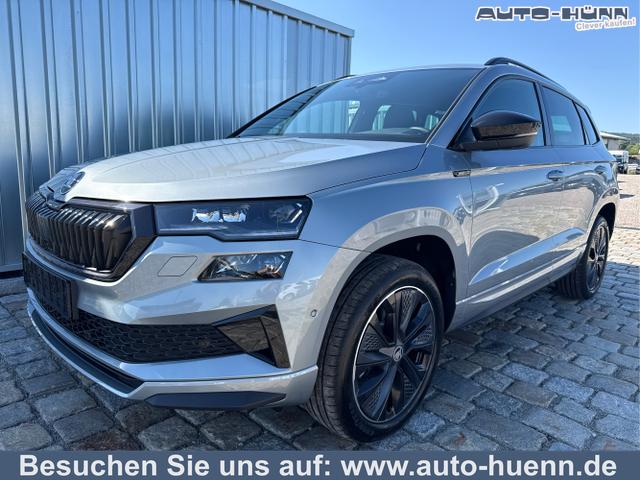 Skoda Karoq - Sportline 1,5 TSI 150 PS DSG -5 Jahre Garantie-Navi-4x Sitzheizung-Canton Sound-Anh&auml;ngerkupplung-LED-Matrix-AppleCarPlay-Android-Auto-ACC-Kessy-2-Zonen-Klimaautomatik-18''Alu-Sofort