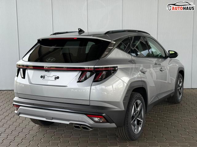 Hyundai TUCSON E-Motion 1.6 T-GDI 2WD 48V DCT / Panoramadach ACC Sitz + Lenkradheizung LED Navi PDC V&H Kamera Alu 18" 