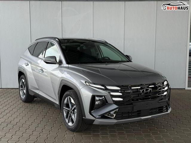 Hyundai TUCSON E-Motion 1.6 T-GDI 2WD 48V DCT / Panoramadach ACC Sitz + Lenkradheizung LED Navi PDC V&H Kamera Alu 18" 