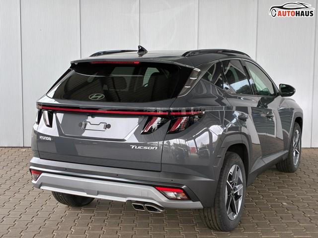 Hyundai TUCSON E-Motion 1.6 T-GDI 2WD 48V DCT / Panoramadach ACC Sitz + Lenkradheizung LED Navi PDC V&H Kamera Alu 18" 