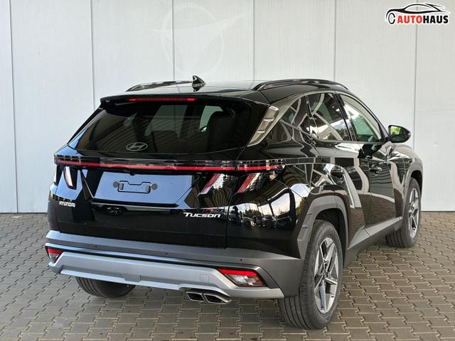 Hyundai TUCSON E-Motion 1.6 T-GDI 2WD 48V DCT / Panoramadach ACC Sitz + Lenkradheizung LED Navi PDC V&H Kamera Alu 18" 