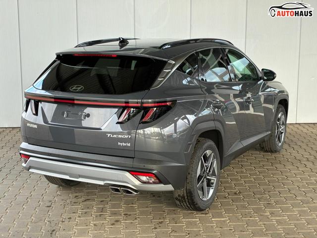 Hyundai TUCSON E-Motion 1.6 T-GDi 2WD HEV / Panoramadach ACC LED Sitz + Lenkradheizung Navi PDC V&H Kamera Alu 18" 