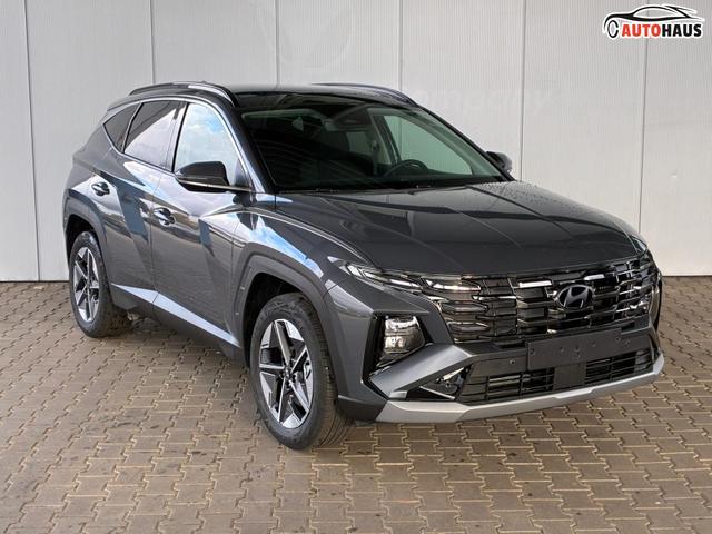 Hyundai TUCSON E-Motion 1.6 T-GDi 2WD HEV / Panoramadach ACC LED Sitz + Lenkradheizung Navi PDC V&H Kamera Alu 18" 