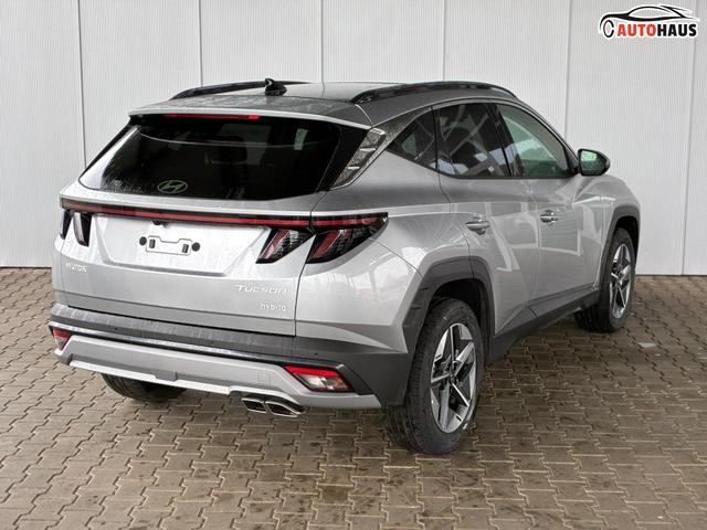Hyundai TUCSON E-Motion 1.6 T-GDi 2WD HEV / Panoramadach ACC LED Sitz + Lenkradheizung Navi PDC V&H Kamera Alu 18" 