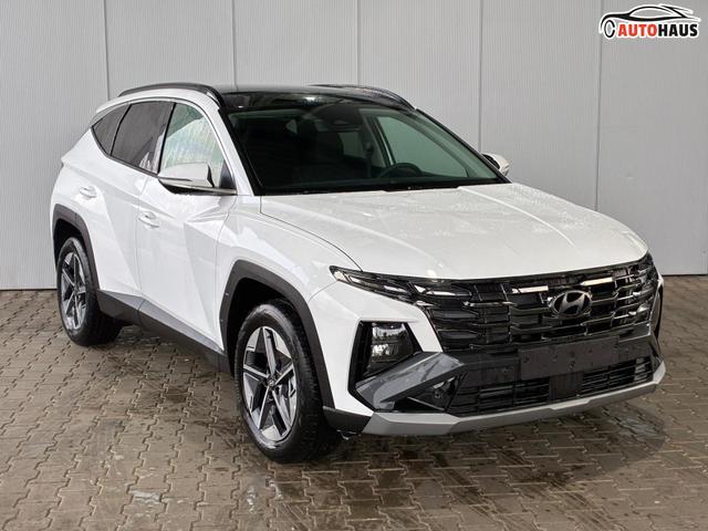 Hyundai TUCSON E-Motion 1.6 T-GDi 2WD HEV / Panoramadach ACC LED Sitz + Lenkradheizung Navi PDC V&H Kamera Alu 18" 