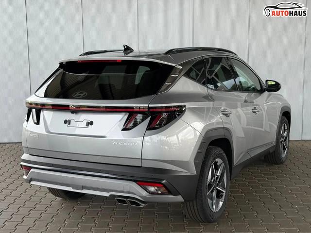 Hyundai TUCSON E-Motion 1.6 T-GDI 2WD 48V DCT / Panoramadach ACC Sitz + Lenkradheizung LED Navi PDC V&H Kamera Alu 18" 