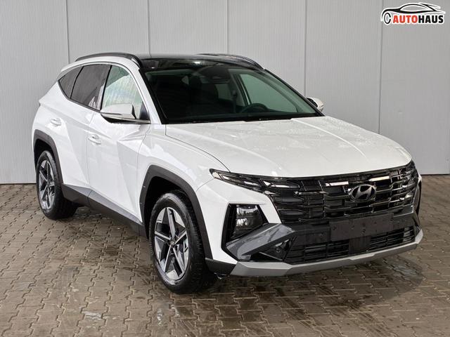 Hyundai TUCSON E-Motion 1.6 T-GDi 2WD HEV / Panoramadach ACC LED Sitz + Lenkradheizung Navi PDC V&H Kamera Alu 18" 