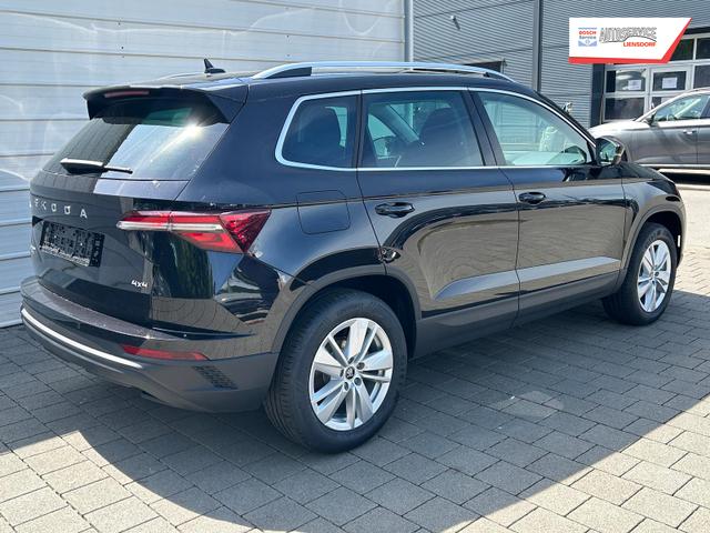Skoda Karoq Extra 2.0 TDI DSG 4x4 AHK*Android Auto*SHZ*ACC*Keyless*Kamera*17" LM* 2Z Klimaauto*SUNSET 