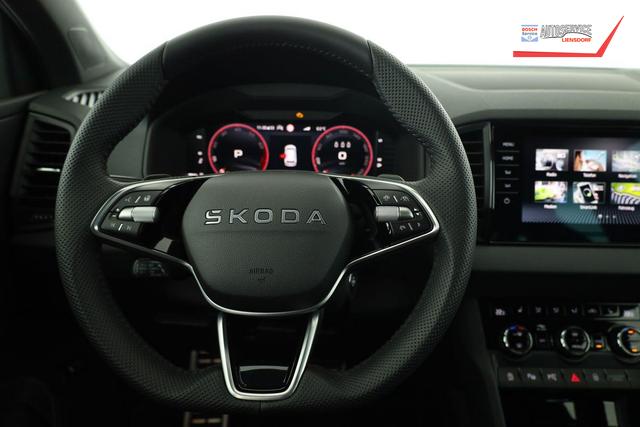 Skoda Karoq Sportline 1.5 TSI DSG Sportline, AHK, Navi, CANTON, Matrix, AreaView, Side, Kamera, el. Klappe, FS-beheizbar 