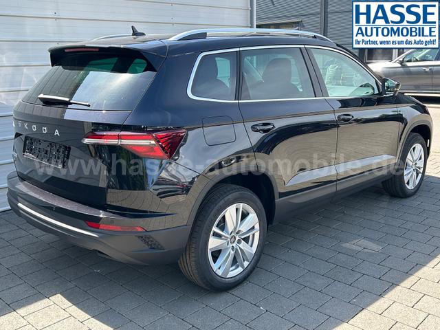 Skoda Karoq Extra Plus 2.0 TDI DSG AHK*Android Auto*Matrix*E-Heck*SHZ*ACC*Keyless*Kamera*17" LM* 2Z Klimaauto*SUNSET 
