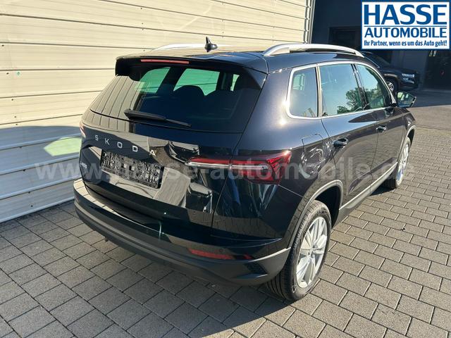 Skoda Karoq Extra Plus 1.5 TSI DSG AHK*Android Auto*Matrix*E-Heck*SHZ*ACC*Keyless*Kamera*17" LM* 2Z Klimaauto*SUNSET 