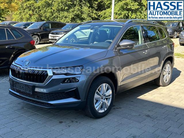 Skoda Karoq Extra Plus 2.0 TDI DSG 4x4 AHK*Android Auto*Matrix*E-Heck*SHZ*ACC*Keyless*Kamera*17" LM* 2Z Klimaauto*SUNSET 