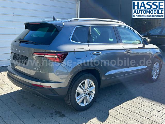 Skoda Karoq Extra Plus 2.0 TDI DSG 4x4 AHK*Android Auto*Matrix*E-Heck*SHZ*ACC*Keyless*Kamera*17" LM* 2Z Klimaauto*SUNSET 
