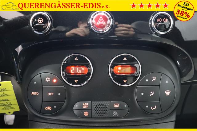 Fiat 500C Dolcevita 1.0 GSE Hybrid 51kW 69PS876 Vesuvio Schwarz 626 - Stoff "Star" mit Einsätzen aus Vinyl Weiß/Schwarz, Ambiente Schwarz, Verdeck Rot Verdeck Rot "Vesuvio Schwarz 097 Nebelscheinwerfer 6HQ Typschild Kundendienst 20H NAVI PAKET: - Uconnect™ Navigationssystem mit 7""-Touchscreen, Radio, USB, Bluetooth und DAB - Instrumentenanzeige als 7""-TFT-Farbdisplay 396 Fußmatten vorne 925 Windschott 195 Rücksitzlehne geteilt umlegbar (im Verhältnis 50/50) 1LR 16""-Leichtmetallfelgen 12 Doppelspeichen 803 Notrad 3K1 KOMFORT PAKET - Klimaautomatik mit Pollenfilter - Außenspiegel elektrisch verstell- und beheizbar 665 Raucher Paket"