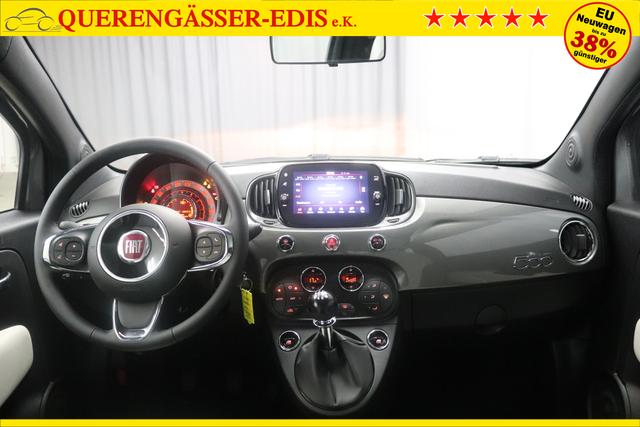 Fiat 500 1.0 GSE Hybrid Dolcevita 695 Pompei Grau 138 Stoff "Star" mit Einsätzen aus Vinyl Stoff Weiß mit Einsätzen in Schwarz, Ambiente Schwarz "097 Nebelscheinwerfer 195 Rücksitzlehne geteilt umlegbar (im Verhältnis 50/50) 3K1 KOMFORT PAKET - Klimaautomatik mit Pollenfilter - Außenspiegel elektrisch verstell- und beheizbar 1LR 16""-Leichtmetallfelgen 12 Doppelspeichen 695 Pompei Grau 803 Notrad 665 Raucher Paket"