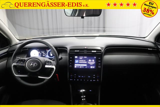 Hyundai Tucson 1.6 T-GDI 6MT 2WD Family MY23 110kW Polar White Sitzpolsterung in Stoff Schwarz