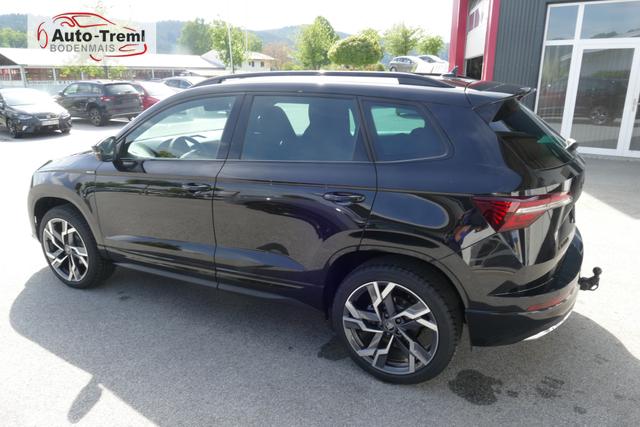 Skoda Karoq Sportline 2.0 TSI DSG 190 PS 4x4 5JG AHK Navi 19" Alu beh.WS. SHZvo+hi Kamera PCDvo+hi variabler Ladeboden 