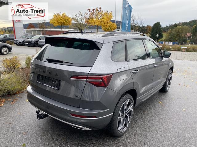 Skoda Karoq Sportline 2.0 TSI DSG 190 PS 4x4 5JG AHK Navi Pano 19" Alu beh.WS. SHZvo+hi Kamera PCDvo+hi variabler Ladeboden 