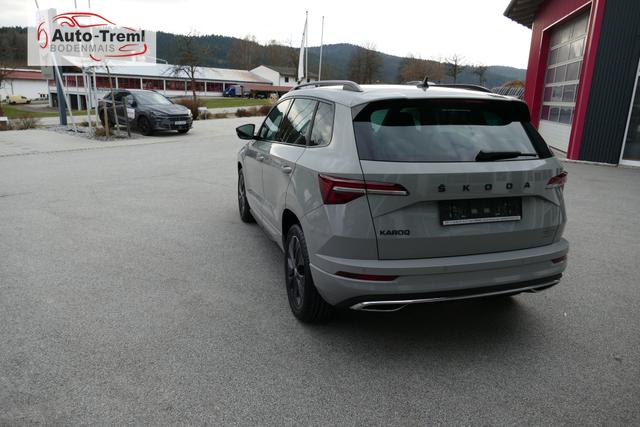 Skoda Karoq Sportline 1.5 TSI DSG 150 PS AHK DCC Virtualles Pedal el.H. Matrix-LED Navi Dopp. Ladeboden Notrad Virtual Cockpit SHZ beh.Lenkrad ACC Facelift 