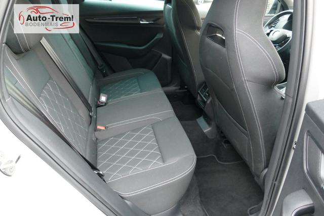 Skoda Karoq Sportline 1.5 TSI DSG 150 PS AHK DCC Virtualles Pedal el.H. Matrix-LED Navi Dopp. Ladeboden Notrad Virtual Cockpit SHZ beh.Lenkrad ACC Facelift 