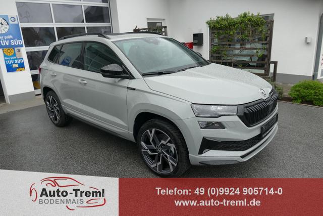 Skoda Karoq - Sportline 2.0 TSI DSG 190 PS 4x4 5JG AHK Navi Pano 19" Alu beh.WS. SHZvo+hi Kamera PCDvo+hi variabler Ladeboden
