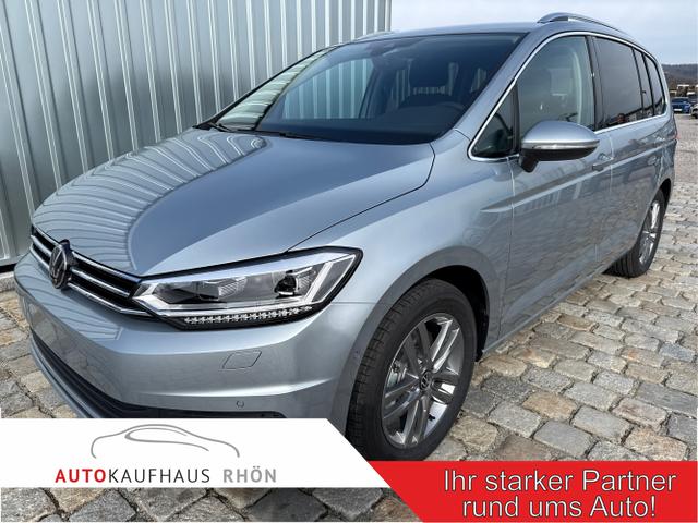 Volkswagen Touran - Comfort Plus Edition 1.5 TSI EVO2 110kW/150PS 7DSG 7-Sitzer-el. AHK inkl. TrailerAssist-Navi-LED-Kessy-R&uuml;ckfahrkamera-Parklenkassist-el.Heckklappe-ACC-3-Zonen Klimaautomatik-Winterpaket-Chrompaket-17''Alu-sofort verf&uuml;gbar