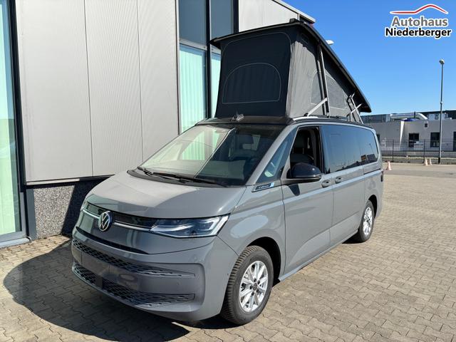 Volkswagen T7 California Ocean 2.0 TDI 150PS DSG, 16" Alu, ELEKTRISCHES Aufstelldach, Privacy-Glas, Climatronic, KÜCHE, Standheizung + FB, Sitzheizung, Park Assist, Parksensoren v/h, Kamera, IQ Light LED-MATRIX, Markise, Side ACC, Ganzjahresreifen, Radio 10" App-Connect 