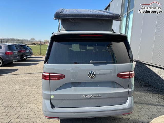 Volkswagen T7 California Ocean 2.0 TDI 150PS DSG, 16" Alu, ELEKTRISCHES Aufstelldach, Privacy-Glas, Climatronic, KÜCHE, Standheizung + FB, Sitzheizung, Park Assist, Parksensoren v/h, Kamera, IQ Light LED-MATRIX, Markise, Side ACC, Ganzjahresreifen, Radio 10" App-Connect 