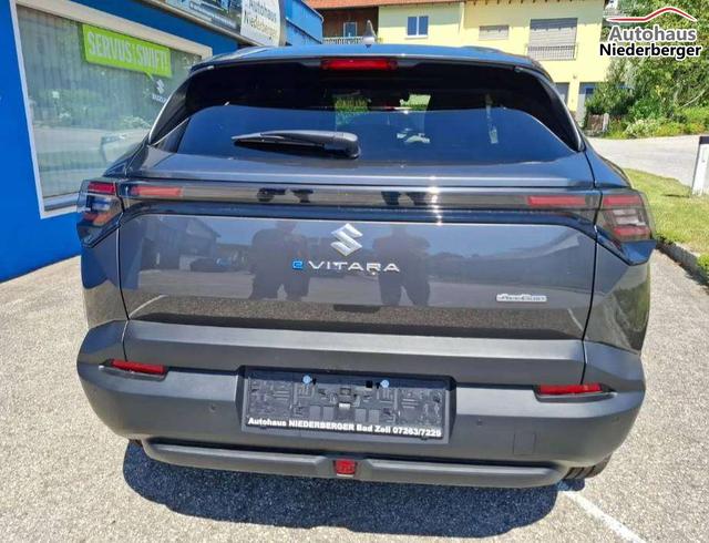 Suzuki Vitara eVitara 61kWh GL+ Allgrip-e Flash mit schwarzem Dach 
