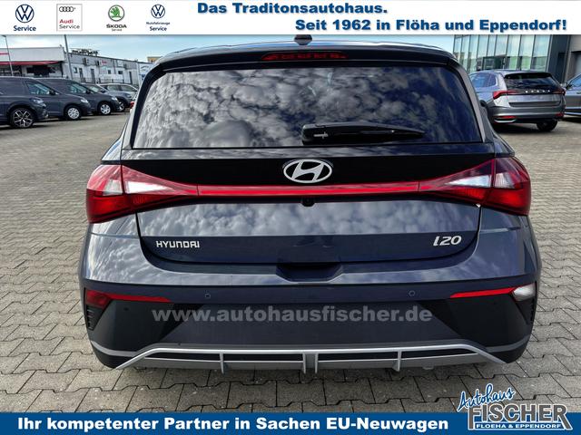 Hyundai i20 Family 1.2i 79PS, AURORA-GRAU METALLIC, WINTER-PAKET, KLIMAAUTOMATIK, 16" ALUFELGEN, 5 Jahre Garantie, NAVIGATION 10,25", Parksensoren hinten, Rückfahrkamera, Alarm, Lederlenkrad, Tempomat, Armlehne vorne, Reserverad, 4x elektr. Fensterheber, Fernlicht-Assisten 