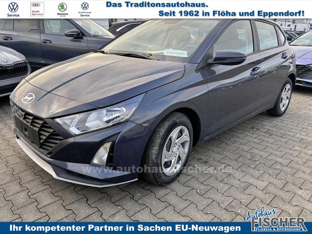 Hyundai i20 - Comfort 1.2i 79PS, AURORA-GRAU METALLIC, 5 Jahre Garantie, NAVIGATION 10,25", Klima, Parksensoren hinten, Rückfahrkamera, Alarm, Lederlenkrad, Tempomat, Armlehne vorne, Reserverad, 4x elektr. Fensterheber, Fernlicht-Assistent