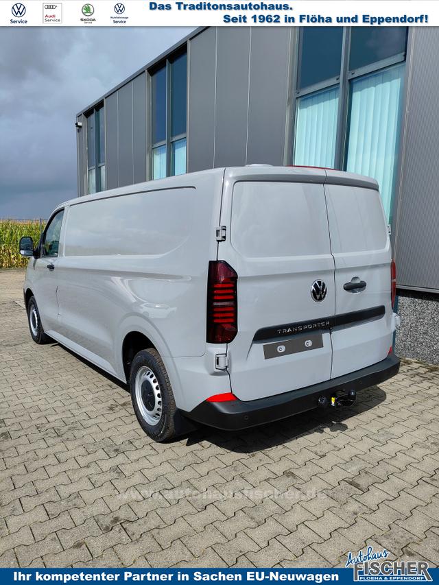 Volkswagen T7 Kastenwagen Basis 2.0 TDI 170PS AUTOMATIK LANG, Grau, HECKFLÜGELTÜREN, 2-Zonen-Klimautomatik, M-Lederlenkrad, Anhängerkupplung, Parksensoren vorn/hinten, Rückfahrkamera, Frontscheibe beheizbar, Ganzjahresreifen, Sitzpaket 46 (inkl. Sitzheizung), Reserverad, 70l Tank 