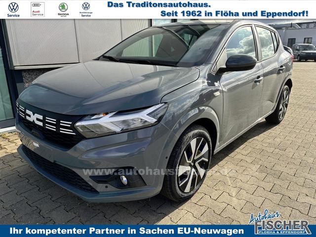 Dacia Sandero - Expression 1.0 ECO-G 100 BENZIN/LPG-GASANLAGE, SONDERLACKIERUNG URBAN-GRAU, Klimaanlage, NAVIGATIONSSYSTEM 8", Parksensoren VORNE + HINTEN, RÜCKFAHRKAMERA, TOTER-WINKEL-WARNER, Nebelscheinwerfer, Tempomat, Lederlenkrad, Armlehne, Spiegel elektr. einstell-/beheizbar