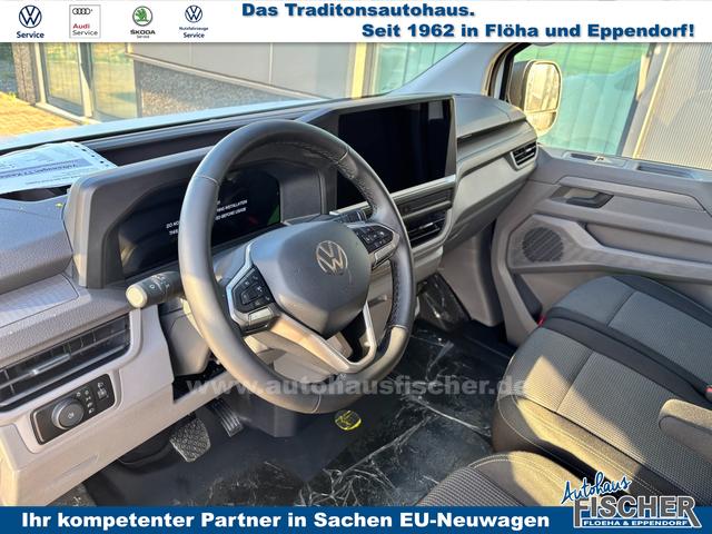 Volkswagen T7 Kastenwagen Basis 2.0 TDI 170PS AUTOMATIK LANG, Weiß, HECKFLÜGELTÜREN, 2-Zonen-Klimautomatik, M-Lederlenkrad, Anhängerkupplung, Parksensoren vorn/hinten, Rückfahrkamera, Frontscheibe beheizbar, Ganzjahresreifen, Sitzpaket 46 (inkl. Sitzheizung), Reserverad, 70l Tank 