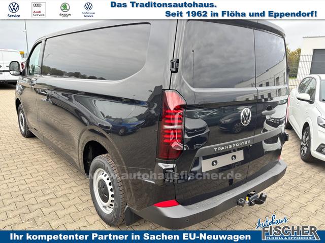 Volkswagen T7 Kastenwagen Basis 2.0 TDI 170PS AUTOMATIK LANG, Schwarz, HECKFLÜGELTÜREN, 2-Zonen-Klimautomatik, M-Lederlenkrad, Anhängerkupplung, Parksensoren vorn/hinten, Rückfahrkamera, Frontscheibe beheizbar, Ganzjahresreifen, Sitzpaket 46 (inkl. Sitzheizung), Reserverad, 70l Tank 