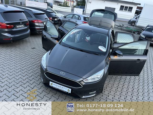 Ford Focus - 1.0 EcoBoost Business*SITZHEIZUNG*FRONTSCHEIBE BEHEIZBAR*1 HAND*EURO 6*SCHECKHEFTFGEPFLEGT*APPLE-CAR-PLAY*ANDROID AUTO*USB*MULTIFUNKTIONSLENKRAD*TEMPOMAT*ESP*ABS*BORDCOMPUTER*WEGFAHRSPERRE*START/STOP AUTOMATIK*SERVOLENKUNG ELEKTR*REIFENDRUCKKONTROLL