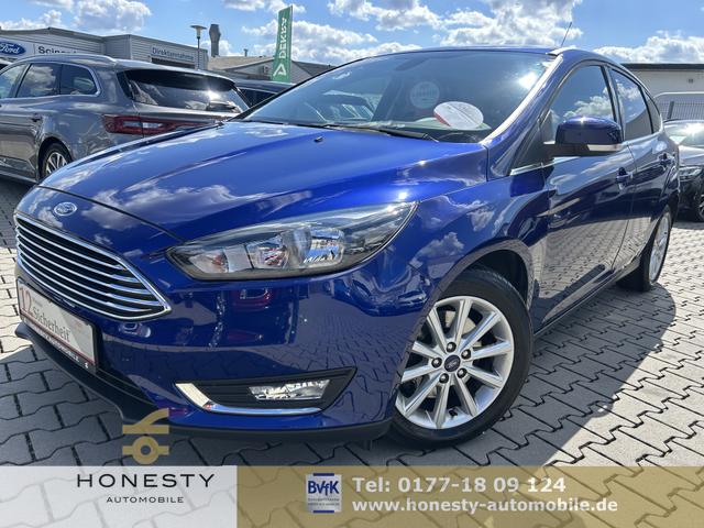 Ford Focus - 1.5 EcoBoost Titanium*SITZHEIZUNG*ABS*USB*LENKRAD BHEIZBAR*ESP*SERVICE NEU*GARANTIE*FRONTSCHEIBE BEHIZBAR*MULTIFUNKTIONSLENKRAD*START/STOP AUTOMATIK*5 GANG*KLIMAAUTOMATIK 2 ZONEN*HECKLEUCHTEN LED*TAGFAHRLICHT LED*SPORTSITZE VORNE*TEMPOMAT*SICHT-PAKE