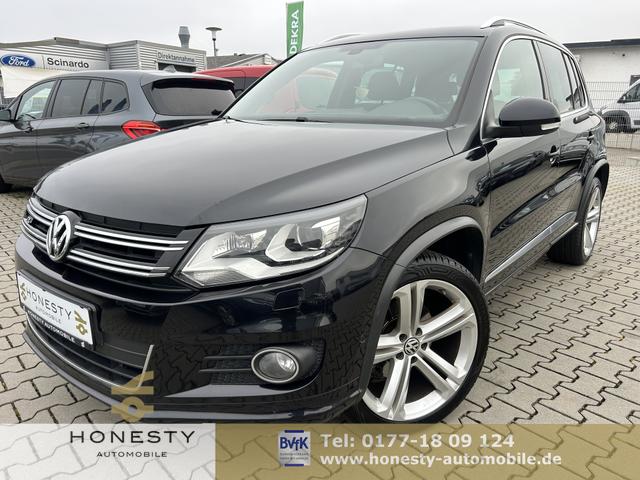 Volkswagen Tiguan - 1.4 TSI BMT Sport & Style*NUR EXPORT ODER GEWERBE*AUTOMATIK*R&Uuml;CKFAHRKAMERA*NAVIGATION*AUTO-HOLD*ELEKTR.PARKBREMSE*ESP*START/STOP AUTOMATIK*SITZHEIZUNG*MULTIFUNKTIONSLENKRAD*TEMPOMAT*ABS*ASR*LICHT+SICHT PAKET*EDS*ESP*BLEUTOOTH*BI-XENON-SCHEINWERFER