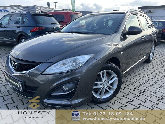 Mazda Mazda6 Kombi - 6 2.0 Active*WENIG KM*SITZHEIZUNG*MULTIFUNKTIONSLENKRAD*KLIMAAUTOMATIK*6 GANG*MP3*8XREIFEN*ZENTRALVERRRIEGLUNG*VERGLASUNG GET&Ouml;NT*SPURWECHSELASSISTENT*BLUETOOTH*ABS*DSC*EBD*NOTBREMS-ASSISTENT*BERGANFAHRHILFE*TEMPOMAT*NEBELSCHEINWERFER*CD-WECHSLER*DSC*1 HA