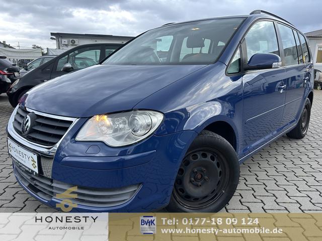 Volkswagen Touran - 1.4 TSI Trendline*7 SITZER*ANH&Auml;NGERKUPPLUNG*T&Uuml;V NEU*8XREIFEN*SCHECKHEFTGEPFLEGT*KLIMA*6 GANG*CD-PLAYER*ABS*ESP*METALLIC-LACKIERUNG*AUTOMATISCHE FAHRLICHTSCHALTUNG*SCHEINWERFER-REINIGUNGSANLAGE*SERVOLENKUNG ELEKTR. GESTEUERT*RADIO*WEGFAHRSPERRE*