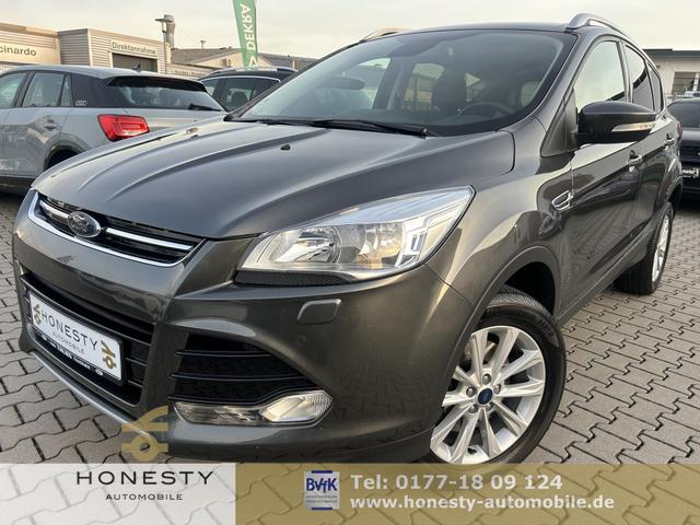 Ford Kuga - 1.5 EcoBoost 4x4 Titanium*AUTOMATIK*DACHRELING*SITZHEIZUNG*NAVIGATION*EURO 6*TAGFAHRLICHT*AABS*ASR*AUDIOBEDIENUNG AM LENKRAD*EBD*ESP*KLIMAAUTOMATIK 2 ZONEN*LENKRAD LEDER*4 SPEICHEN*FRONTSCHEIBE BEHEIZBAR*SPORTSITZE VORN*ALLRADANTRIEB*WINTER-PAKET*AUX-IN*