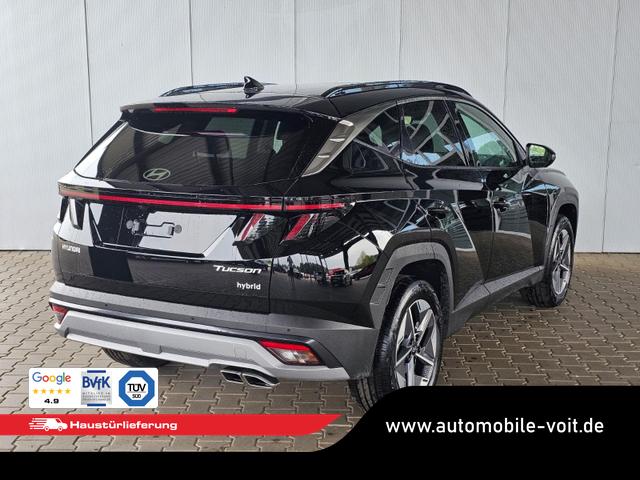Hyundai TUCSON E-Motion 1.6 T-GDi 2WD HEV / Panoramadach ACC LED Sitz + Lenkradheizung Navi PDC V&H Kamera Alu 18" 