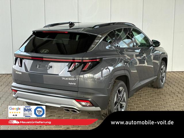 Hyundai TUCSON E-Motion 1.6 T-GDi 2WD HEV / Panoramadach ACC LED Sitz + Lenkradheizung Navi PDC V&H Kamera Alu 18" 