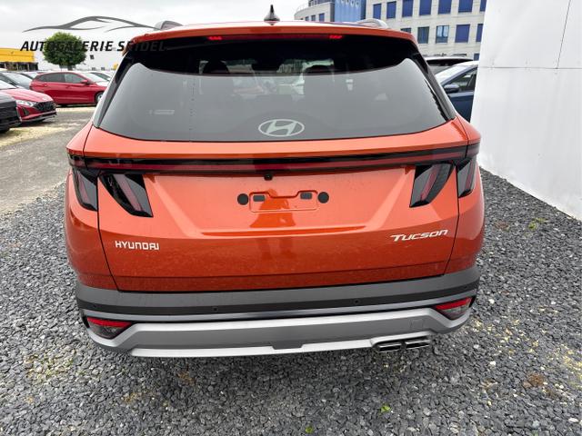 Hyundai / TUCSON / Orange / / / MHEV DCT ACC SHZ 360 MATRIX KRELL 