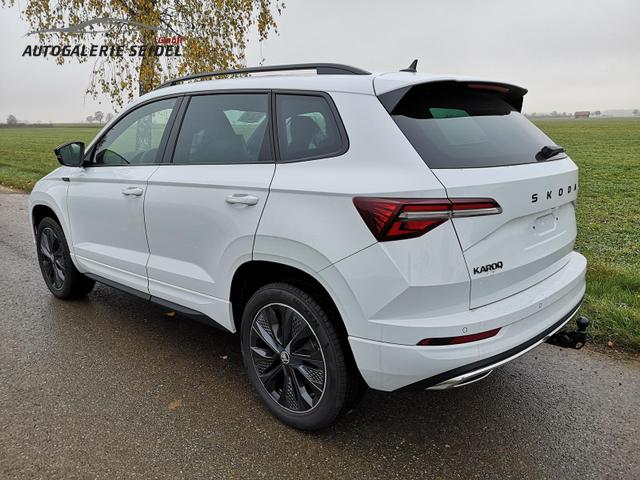 Skoda Karoq Sportline 1.5TSI DSG AHK Matrix ACC Navi Sound Totwinkel 